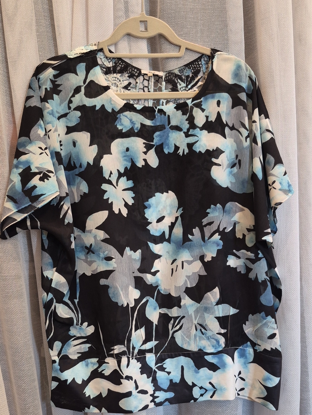 Black Floral Short-Sleeve Blouse with Light Blue Accents